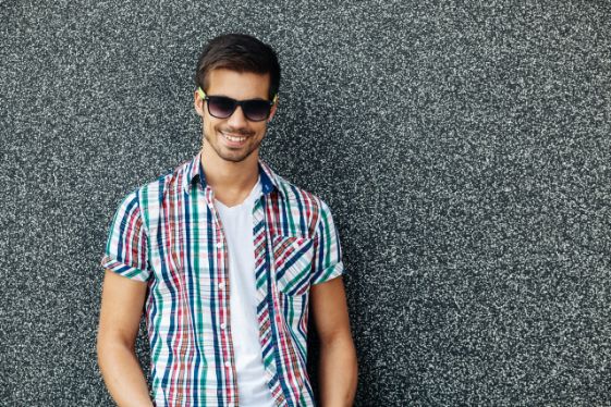 Handsome man with sunglasses outdoor portrait.