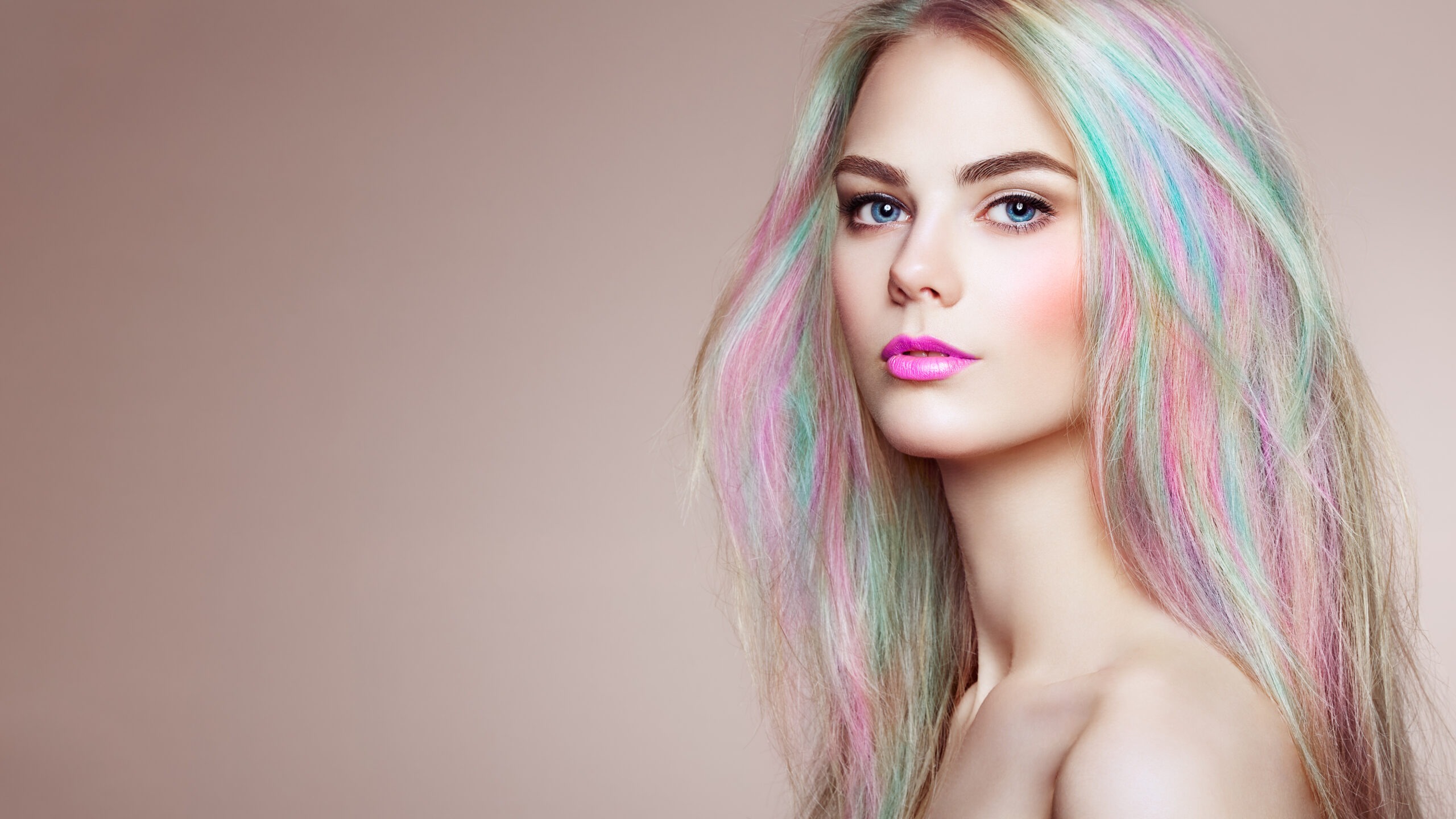 Beauty fashion model girl with colorful dyed hair