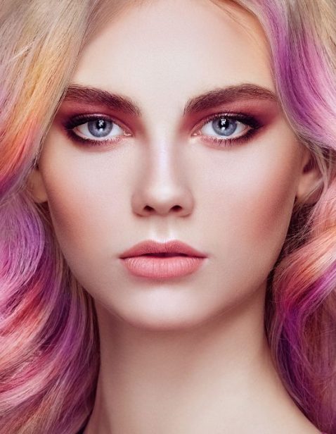 Beauty fashion model girl with colorful dyed hair